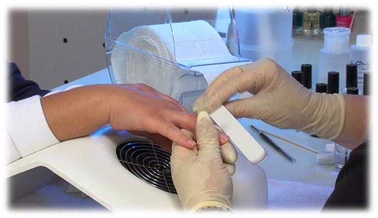 Aspirador restos de uñas.